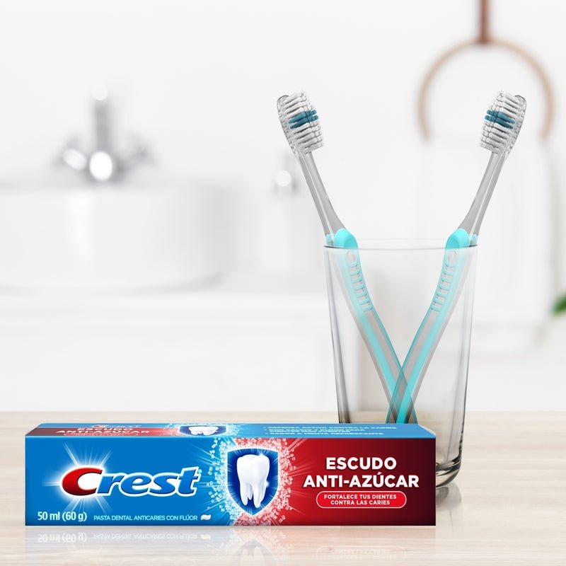 Pasta dental Anticaries con Flúor Crest Escudo Anti - azúcar 140 ml - Farmacias Arrocha